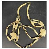 Hand carved elephant necklace