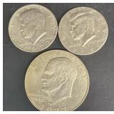 Eisenhower 19 $77 coin and two Kennedy half