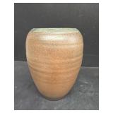 Pottery hand, throne, vase signed on bottom