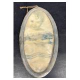 Antique oval metal frame with little boy