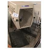 2 Dog Crates, one Plastic 33' long,