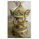 COLLECTIBLE SHELF SETTER-CAROUSEL