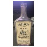 VINTAGE GLASS BOTTLE W/LABEL