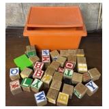 WOODEN BLOCKS W/TUPPERWARE CONTAINER
