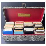 Collection of eight track tapes in rattlesnake