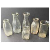 Assortment of milk bottles