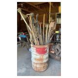 Barrel, full of hand tools