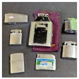 Assortment of cigarette lighters, including
