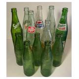 Assortment of Soda Bottles-7UP-MT.Dew and others
