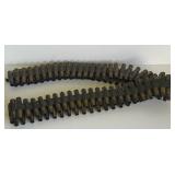 MACHINE GUN BELT WITH BRASS CASINGS