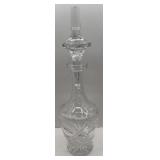 crystal decanter featuring intricate cut-glass