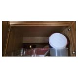 2 pyrex measuring cups igloo cooler and contents