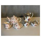 Pair of China Tea Pots, Creamers and Sugars