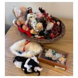 Collection of Miniature Dolls in Wicker Basket