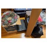 Stack of Storage Bins Full of Christmas Decoration