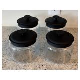 Four Glass Canisters