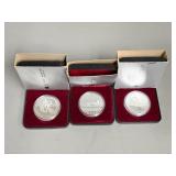 Three Canadian One Dollar Coins