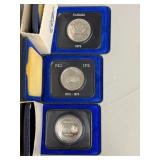 Three Canadian One Dollar Coins