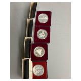 Four Canadian One Dollar Coins