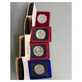 Four Canadian One Dollar Coins