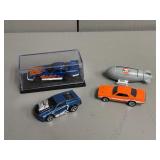 Four Mattel Hot Wheels Toys