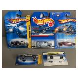 Four Mattel Hot Wheels Toy Cars