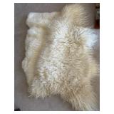 Two Sheepskin Rugs