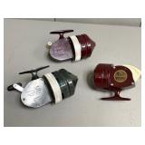 Three Spincast Reels
