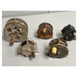 Four Baitcast Reels, One Fly Fishing Reel