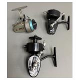 Three Olympic Spinning Reels in Metal Tackle Box