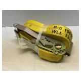 Industrial grade,  yellow ratchet strap