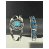 Silver and turquoise colored stones cuff