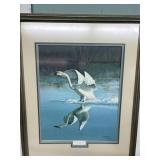 This is a framed limited edition print titled