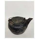 Cast iron kettle flower on lid number 8 on spout