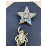 vintage atomic starburst brooch features