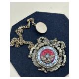 vintage Coro pendant necklace features a heraldic