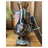 amber glass vase features cut-to-clear details