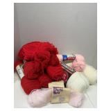 Red White Pink Skeins of Yarn Needle