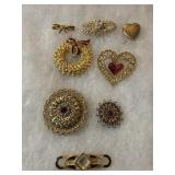 Goldtone Costume Brooches and heart locket