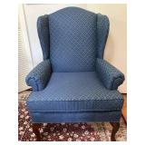 Traditional blue fabric wingback chair.  42'H