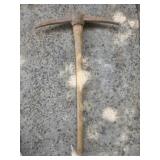 Vintage cast-iron pickaxe