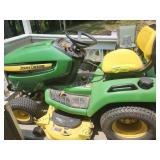 John Deere X540 lawn mower and a rear bagger