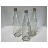 Three, vintage cheerwine bottles