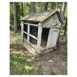 vintage-style wooden chicken coop (winning bidder