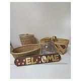 Woven trash can and two baskets with piggy bank