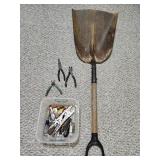 Antique rustic snow shovel with miscellaneous