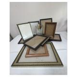 12 Assorted picture frames and wall decor mostly