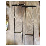 Two metal sign holders