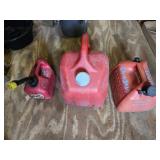 Three plastic gas cans