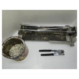 Manual tile cutting tools and tile spacers